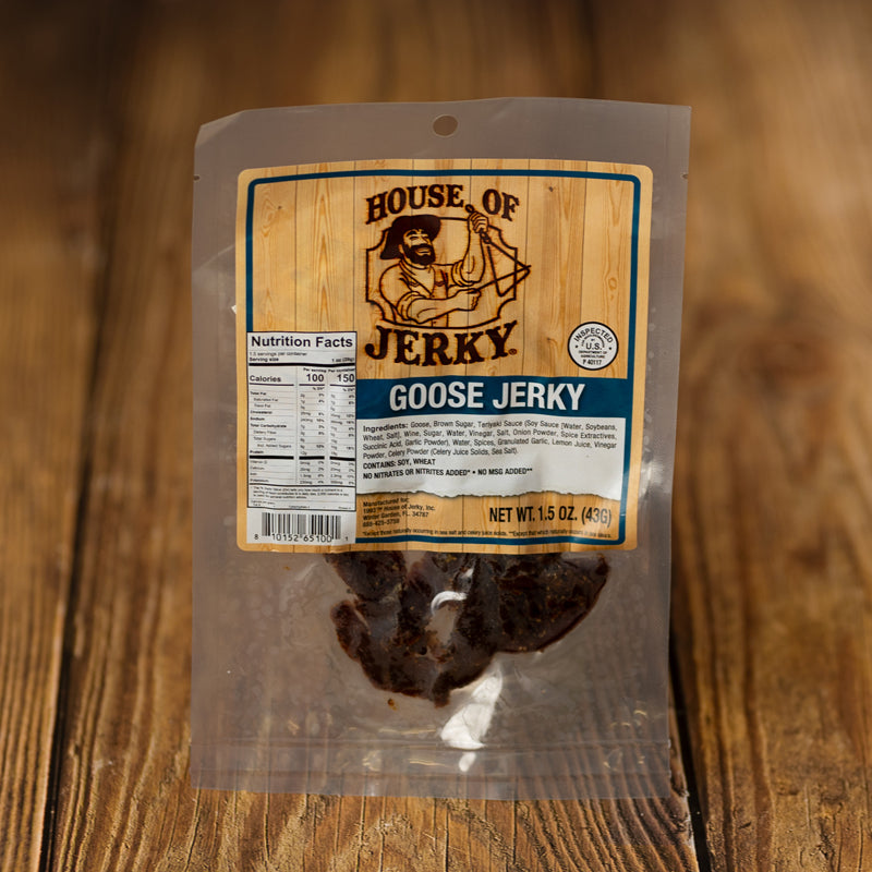 a bag of goose jerky on a wood background